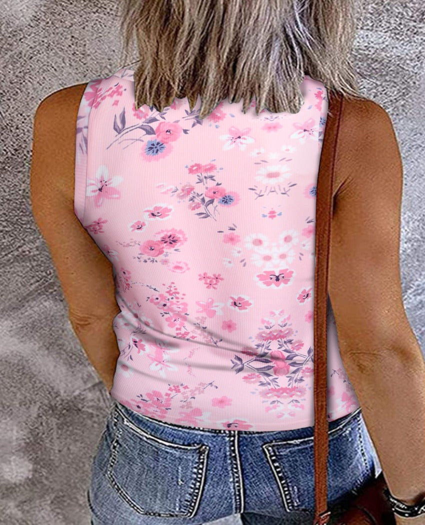 Flaunt your style with our floral V-neck tank, perfect for summer with comfy fabric and chic snap details. Ideal for every casual occasion!