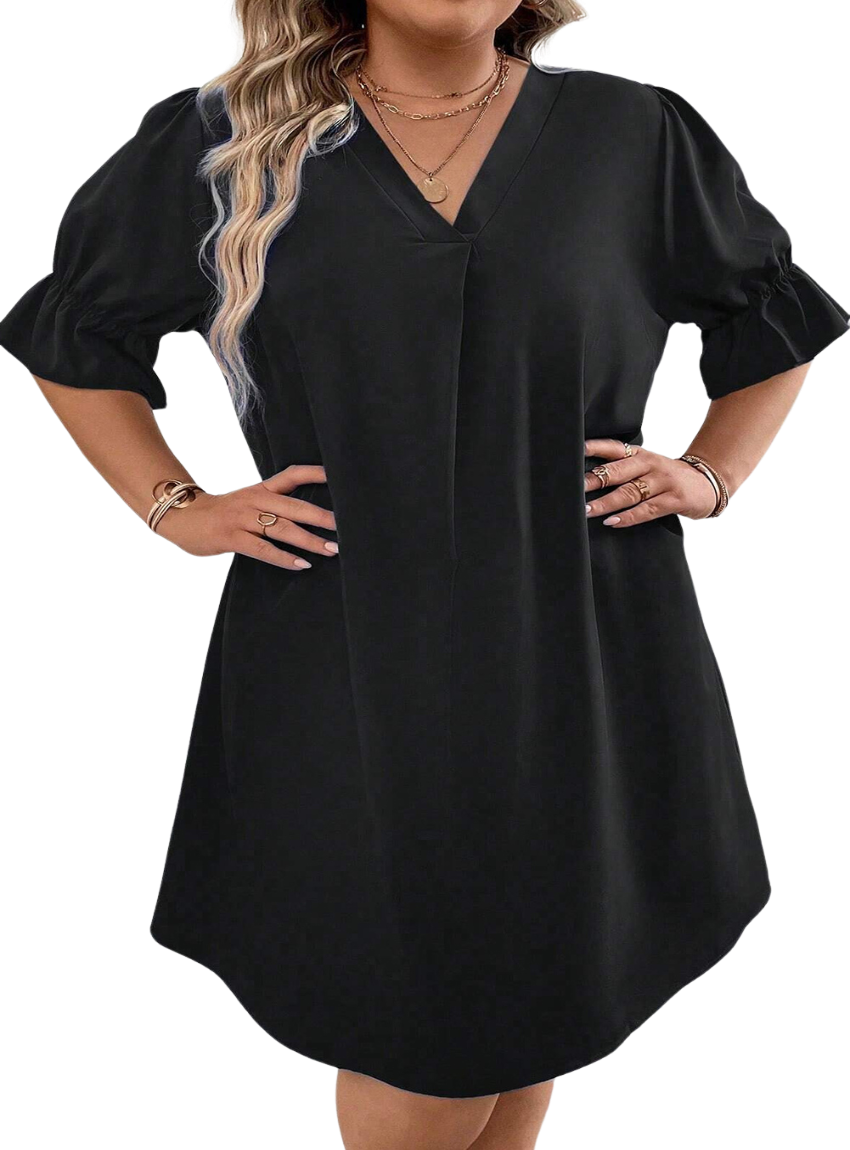 Elevate your style with our Plus Size Mini Dress featuring a chic V-neck and ruffled puff sleeves for a flattering, fashionable look.