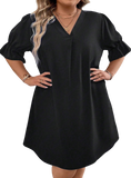 Elevate your style with our Plus Size Mini Dress featuring a chic V-neck and ruffled puff sleeves for a flattering, fashionable look.