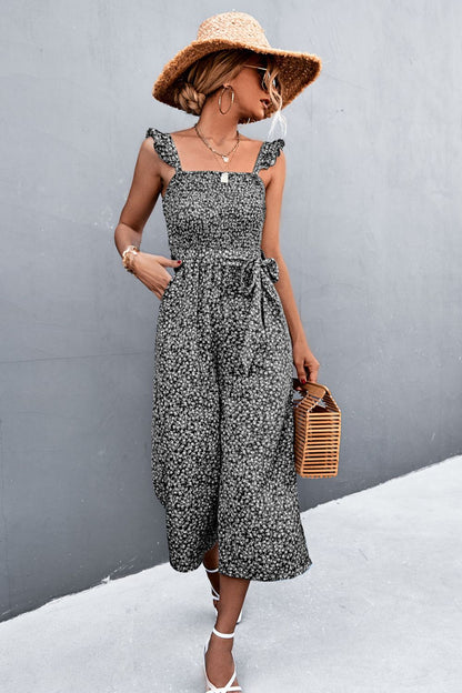 Stylish Printed Jumpsuit with ruffle straps & a smocked waist for a flattering fit. Perfect for any occasion!