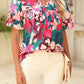 Vibrant flower print blouse with puff sleeves