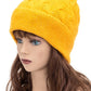 Slouchy mustard winter beanie with textured cable design

