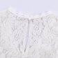 White lace sleeveless top featuring delicate floral patterns
