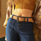 Stylish camel suede western belt with detailed antique gold buckle.
