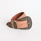 Women's camel western buckle belt, ideal for casual or bohemian looks.
