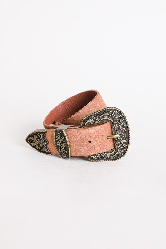 Women's camel western buckle belt, ideal for casual or bohemian looks.
