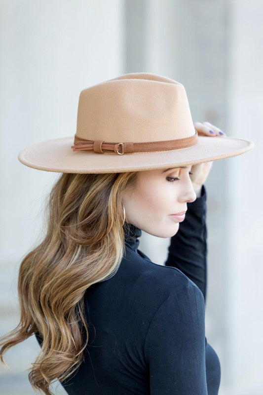 Adjustable camel wide brim Panama hat with a modern design.
