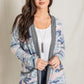 Pink camo cardigan with a soft, lightweight feel and casual look.