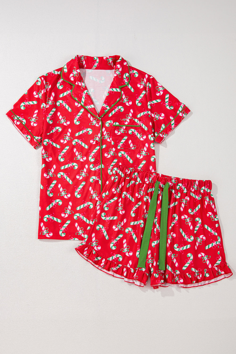 Knotted pajama shorts with a candy cane pattern, great for cozy nights in.
