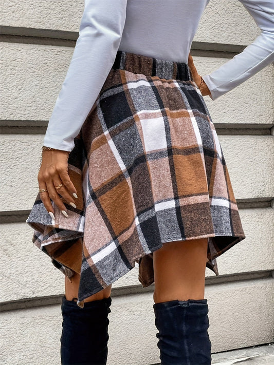 Autumn plaid skirt with caramel and chocolate hues, styled with boots.