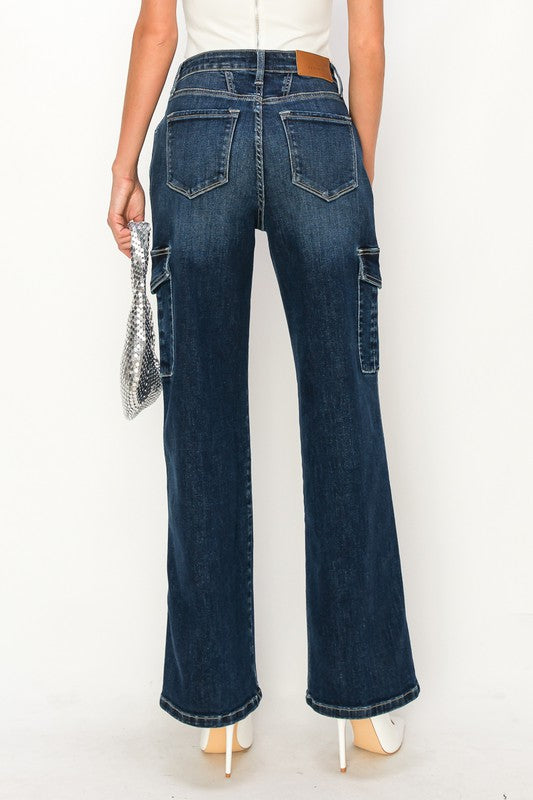 Women's wide-leg jeans with practical cargo pockets and dark wash.
