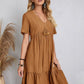 Relaxed fit brown dress with playful tiered design

