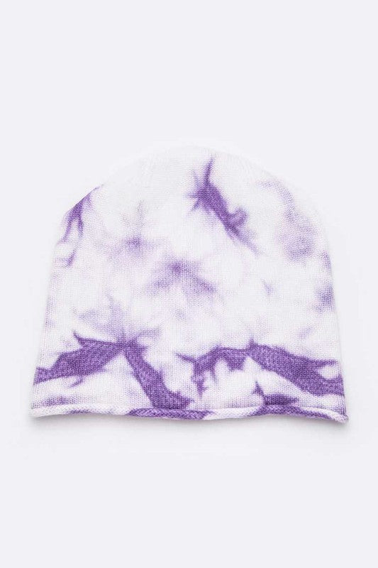 Relaxed cotton beanie featuring purple tie dye swirl pattern

