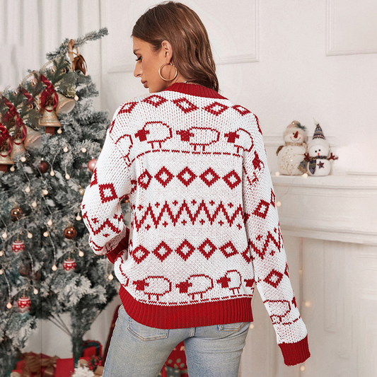 Casual red and white geometric knit sweater styled for holiday gatherings and cozy winter lounging.