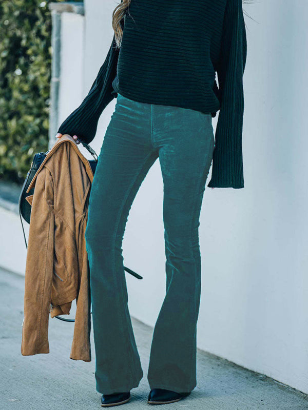 Casual green flared corduroy pants ideal for spring and autumn looks.
