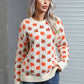 Casual ivory sweater with an autumn leaf design, ideal for staying cozy during the fall season.