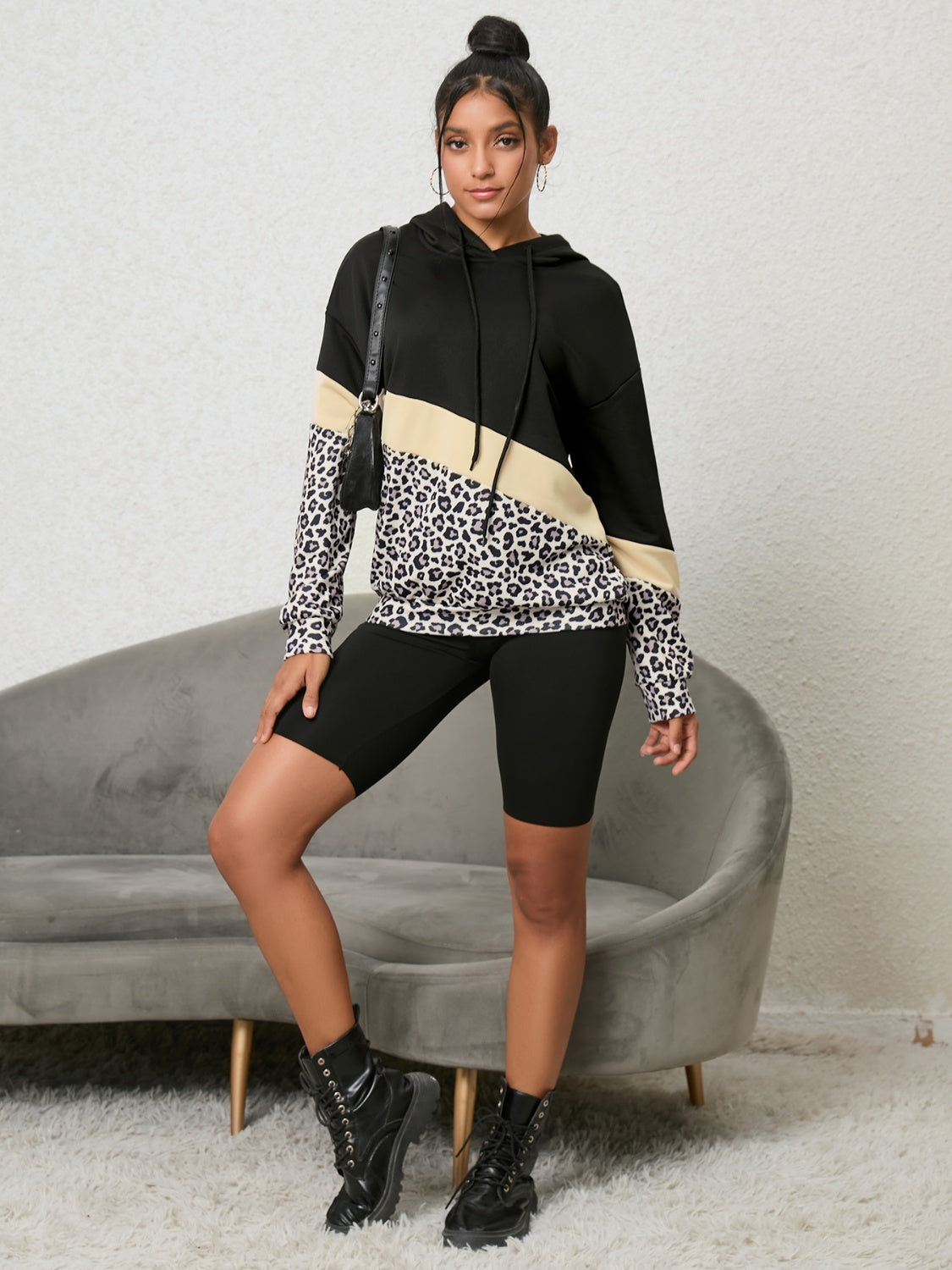 casual hoodie with animal print and color block design
