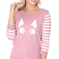 Pink cotton kitty face sweater with fun black and white striped sleeves.
