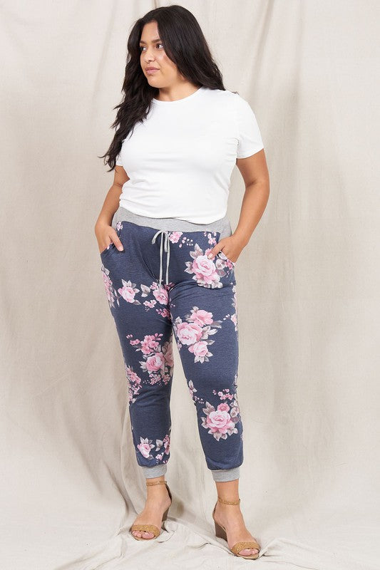 Women's plus size sweatpants in floral print, perfect for casual wear
