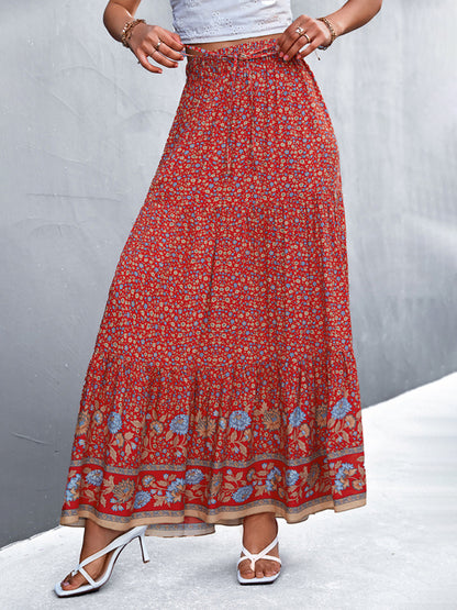 Full-length image of a casual red bohemian floral maxi skirt for summer.
