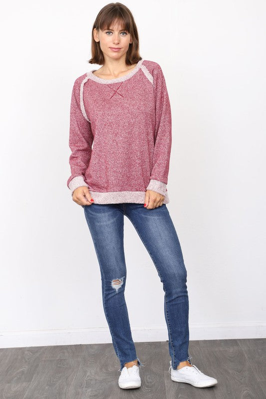 Burgundy shimmer French terry pullover with a relaxed fit.
