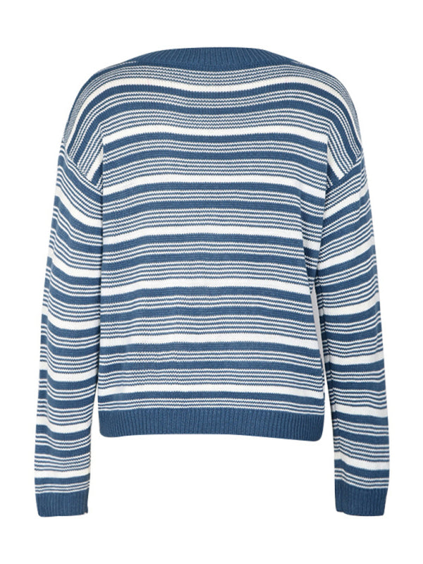 Blue striped knit sweater with a round-neck design, perfect for casual autumn and winter days.

