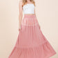 Rayon and spandex lace-trimmed maxi skirt in solid color.
