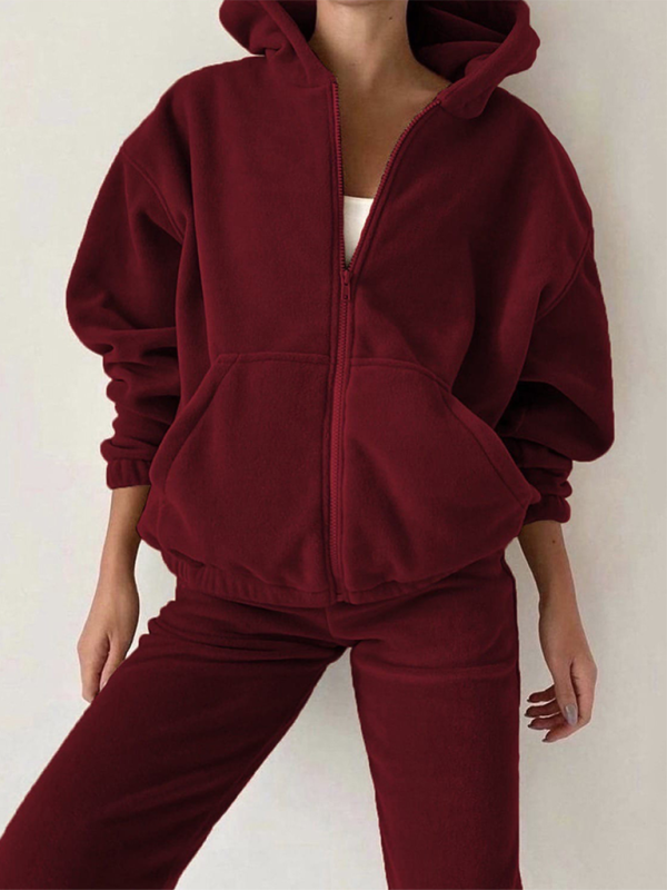 Closeup of the rich wine sweater set featuring woven polyester material.
