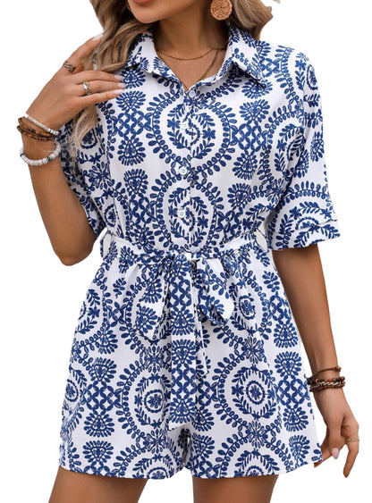 Blue and white boho print romper with button-down front.