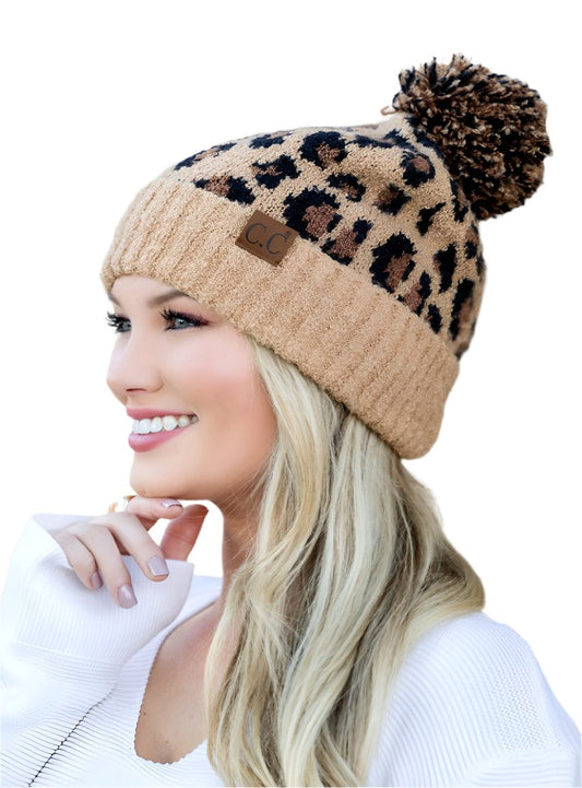 Latte-colored leopard pom beanie with soft acrylic yarn and a stylish design
