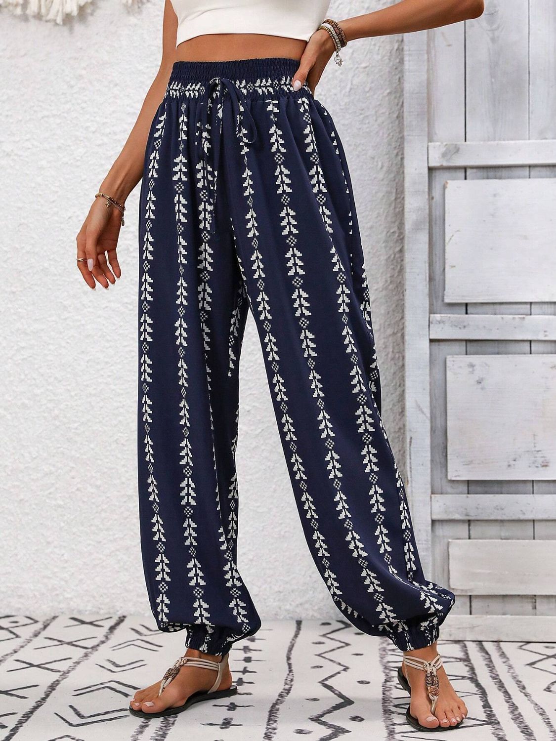 Breathable navy pants with adjustable drawstring and unique pattern