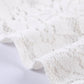 Stylish sleeveless lace top with a timeless white finish
