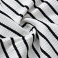 Comfortable striped tank top in black and white, ideal for summer.