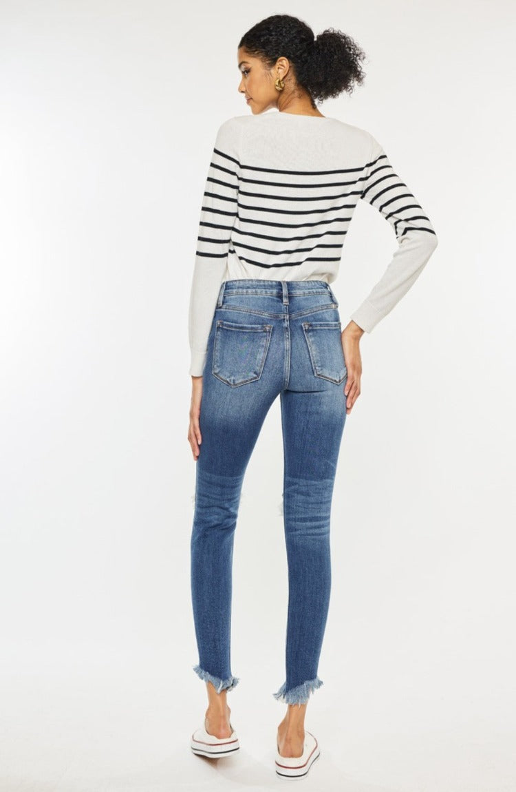 Shop the Kancan High Waist Skinny Jeans with edgy distress and raw hems for a trendy, flattering fit that elevates any outfit.