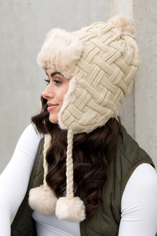 Charming braided accent hat with faux fur pom
