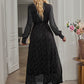 Chic black maxi dress with V-neck design
