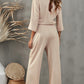 Chic boat neck jumpsuit in apricot with a keyhole back and flattering fit.
