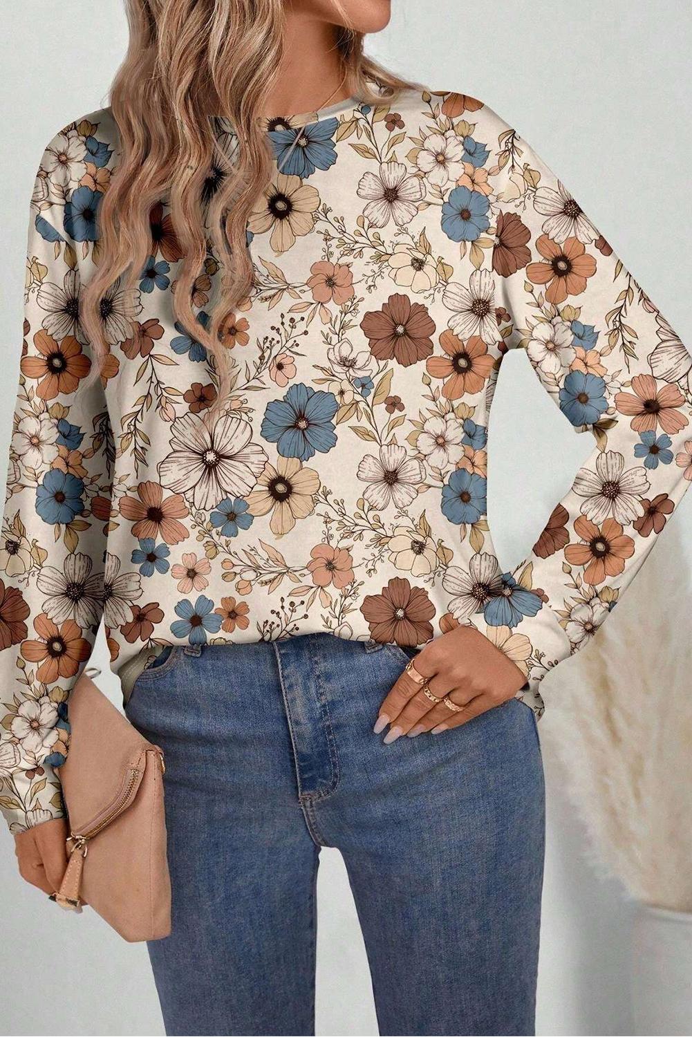 Chic boho-style khaki top with a classic crew neck and floral details.
