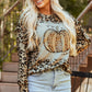 Comfy and chic leopard pumpkin top, great for layering in cooler weather.
