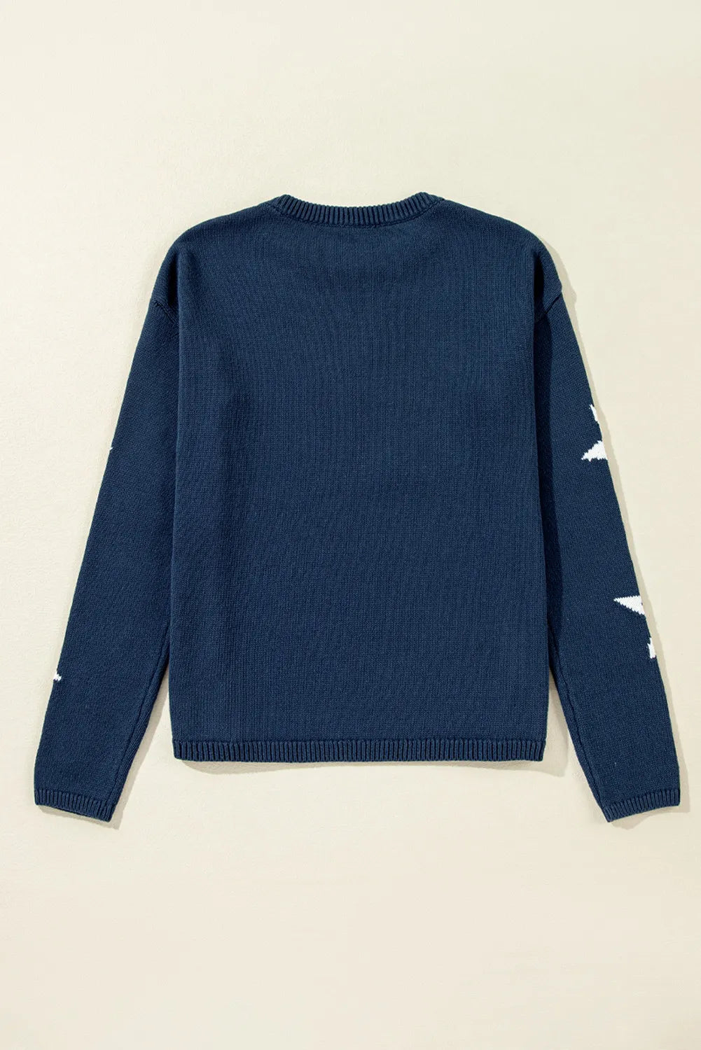 Chic navy sweater with a bold star pattern, perfect for casual, everyday wear.