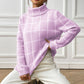 Soft pink knit turtleneck sweater with chic plaid design