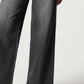 Women's black high-rise wide-leg jeans with a chic, modern look.
