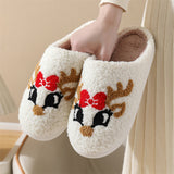 Christmas deer slippers with antlers and a red bow embroidery for festive charm
