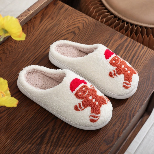 Christmas gingerbread man slippers with festive Santa hat embroidery
