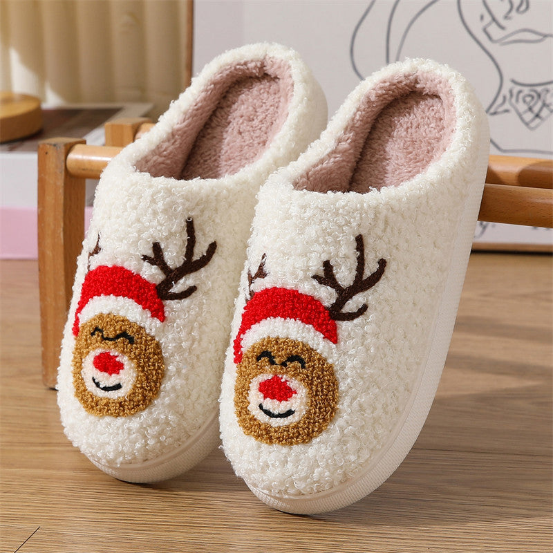 Christmas reindeer slippers with red nose, Santa hat, and antlers for festive charm
