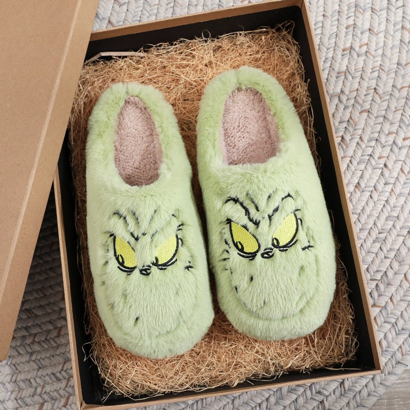 Festive Grinch slippers for Christmas lounging at home.
