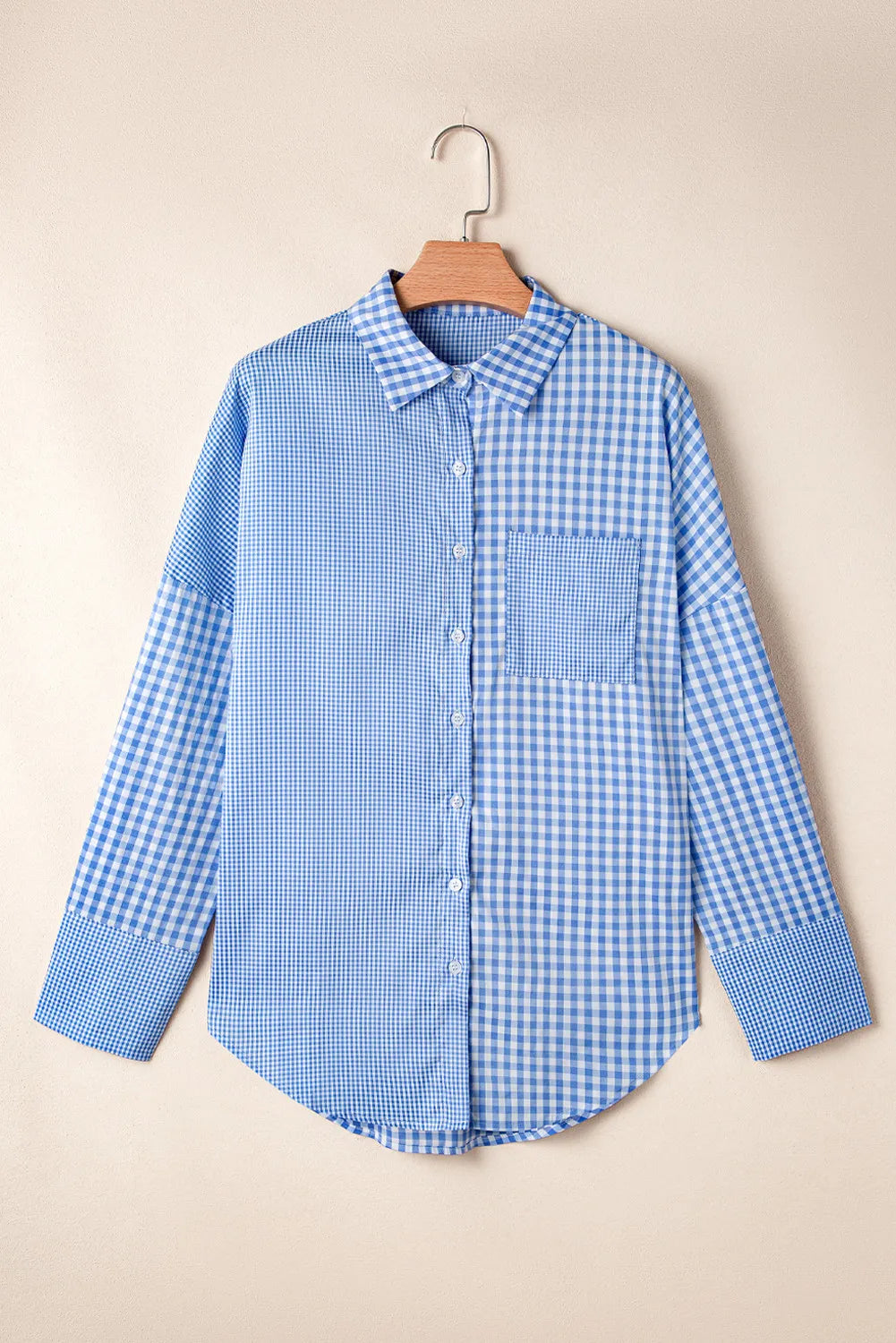 Timeless women’s blue gingham shirt with button-down details
