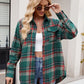 Casual dark green plaid shirt styled with gold jewelry and sunglasses.
