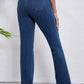 Women's high waist jeans with a straight-leg fit and moderate stretch.
