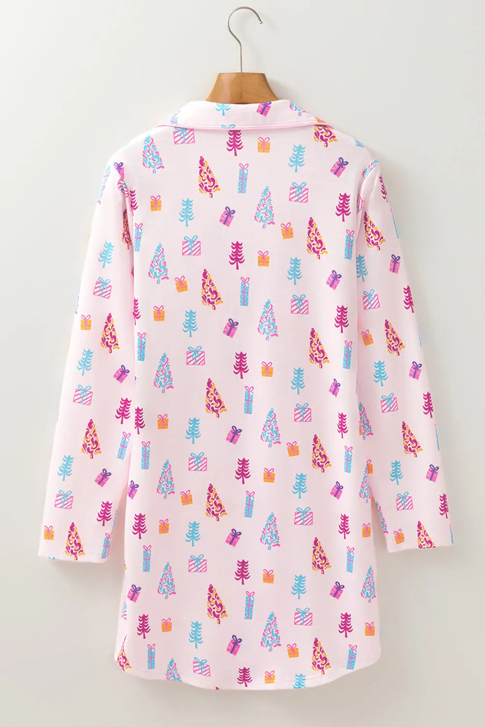 Holiday-themed pink sleep shirt with a bright and cheerful design.
